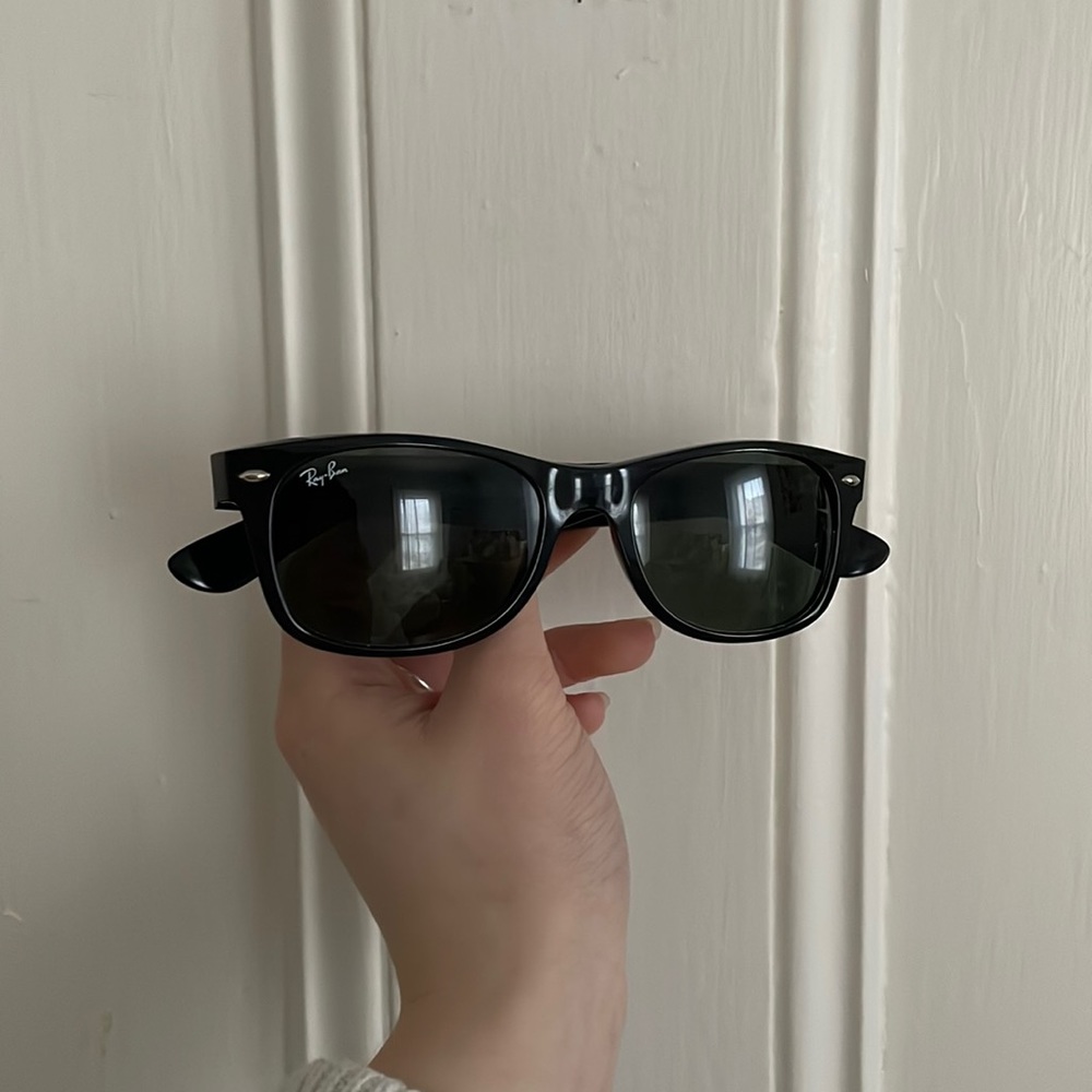 Black ray-ban sunglasses with the case holder and wiper included!